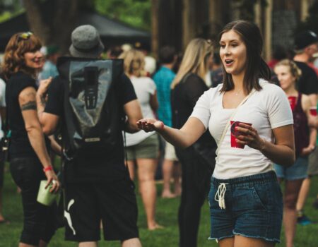 woman holding red cup