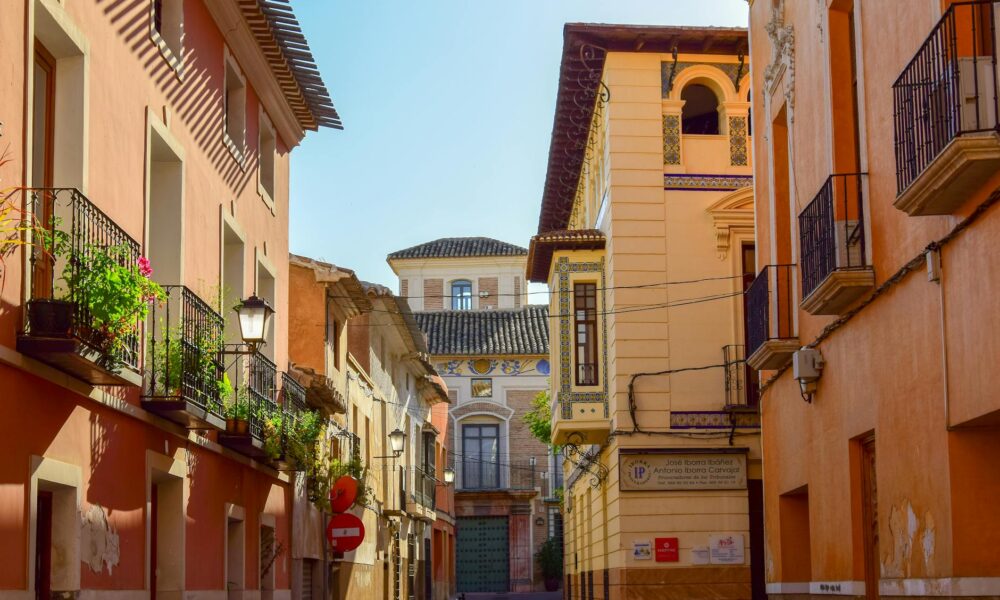 brown buildings with balconies