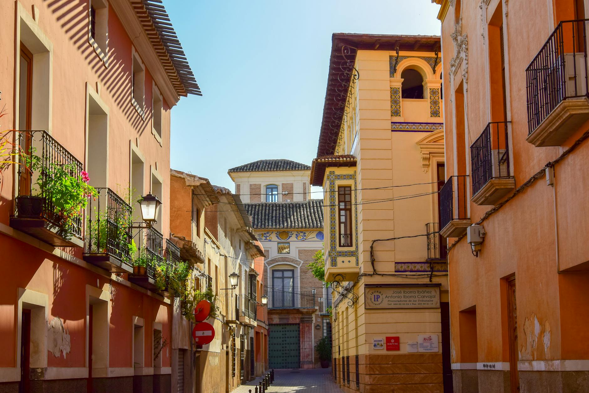 brown buildings with balconies