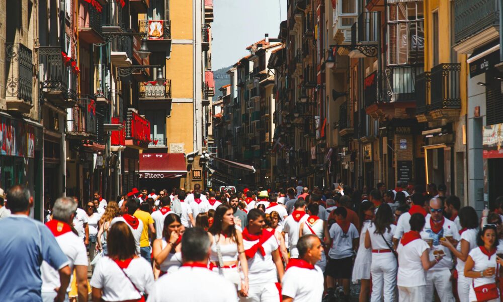 crowd on a pampalona street during the san fermin festival