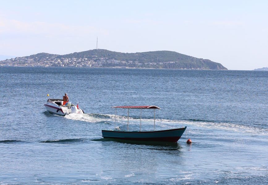 scenic sea view with boats and island