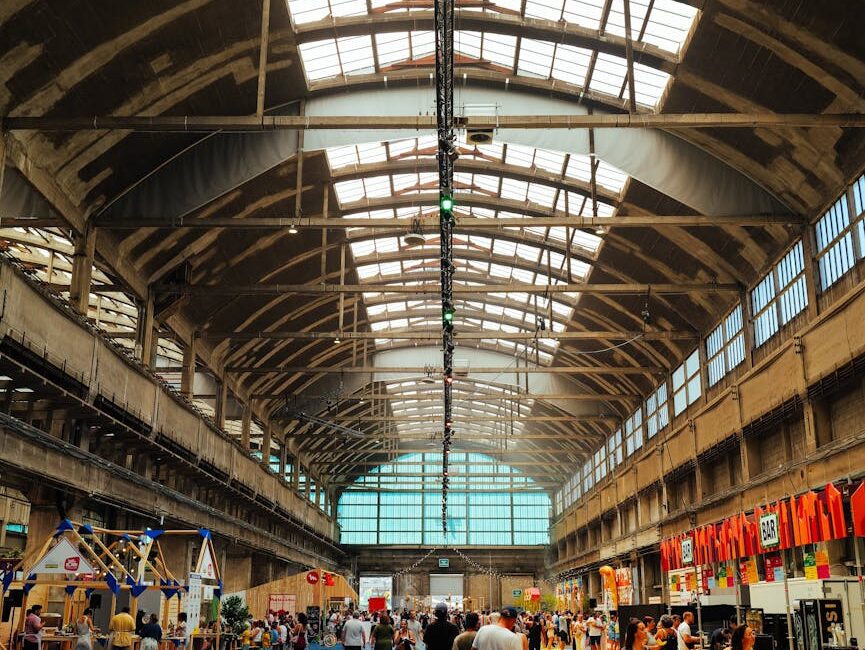 spacious indoor market with colorful stalls