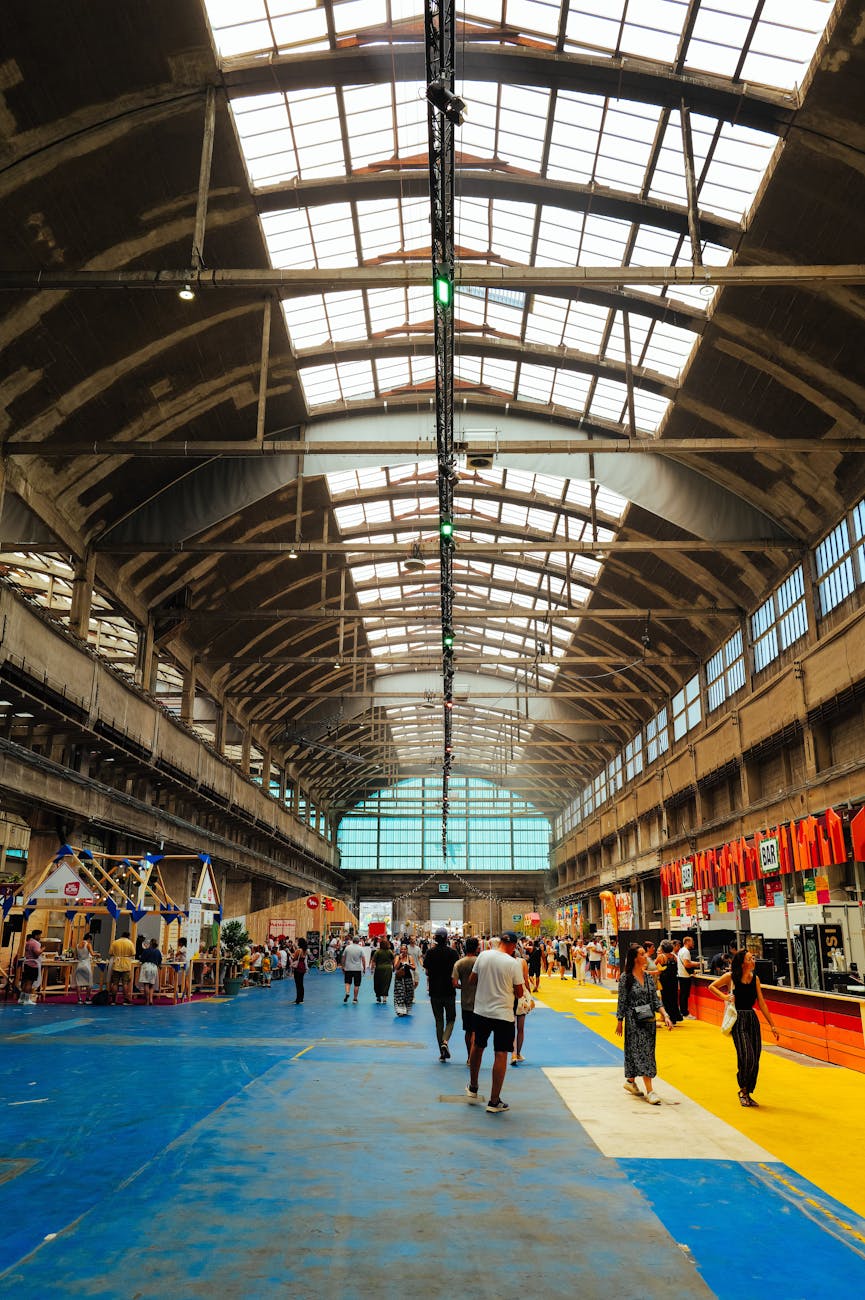 spacious indoor market with colorful stalls